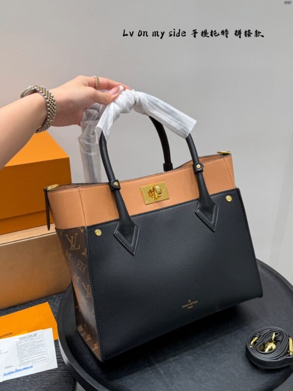 lv on my side handheld tote