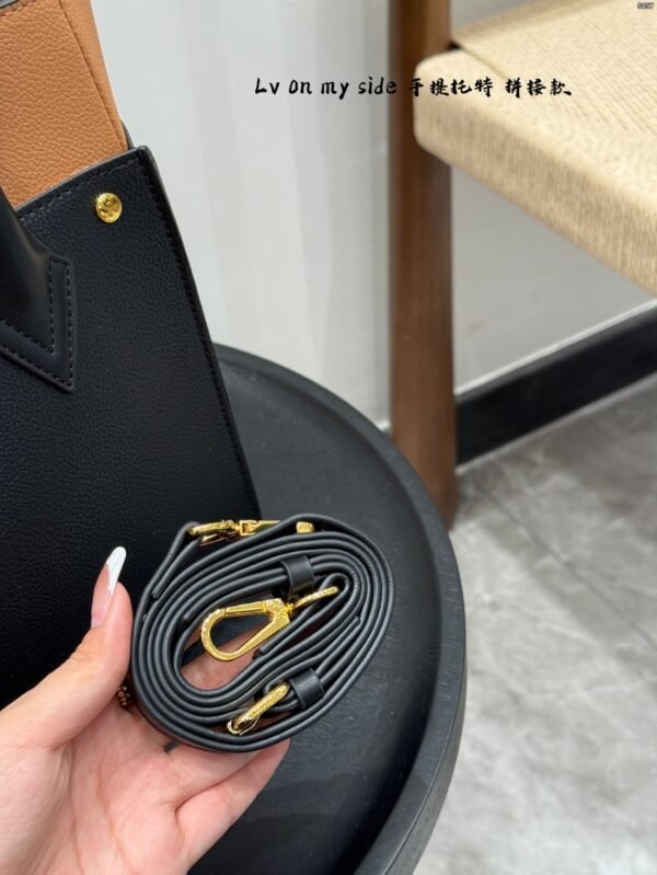 lv on my side handheld tote