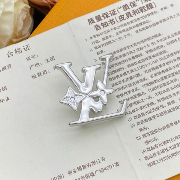 lv brooch