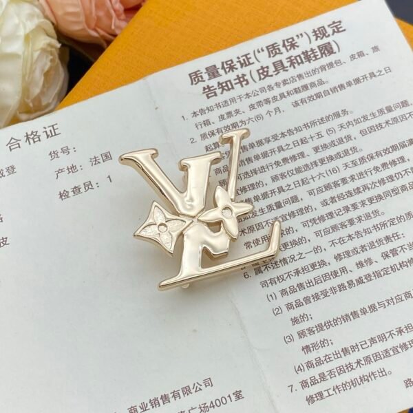 lv brooch