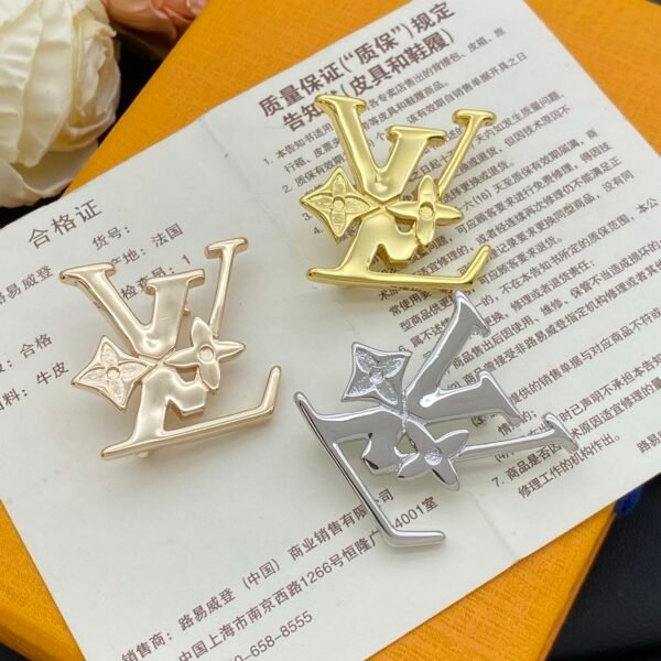 lv brooch