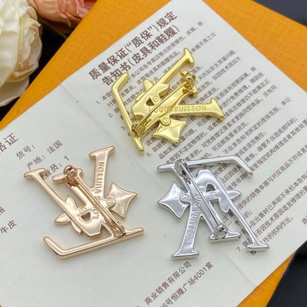 lv brooch